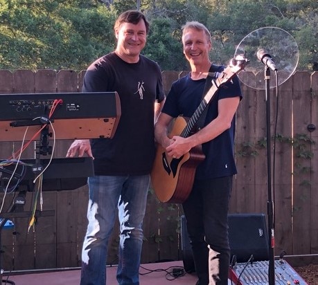 The Wachhorst Brothers on an outdoor stage.