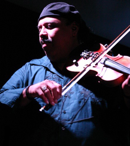 Carlos Reyes with his violin.